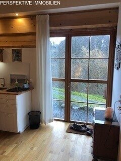 Einfamilien-Naturstammhaus mit 2 Einliegerwohnungen 