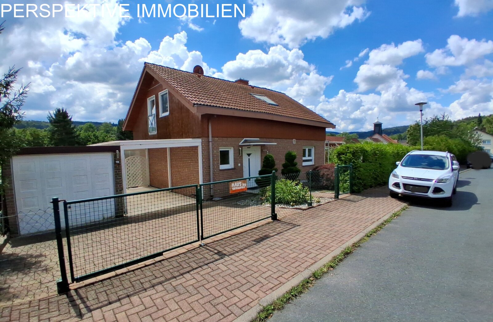 Modernes freistehendes 1-Familienhaus + Baugrundstück in ruhiger Lage