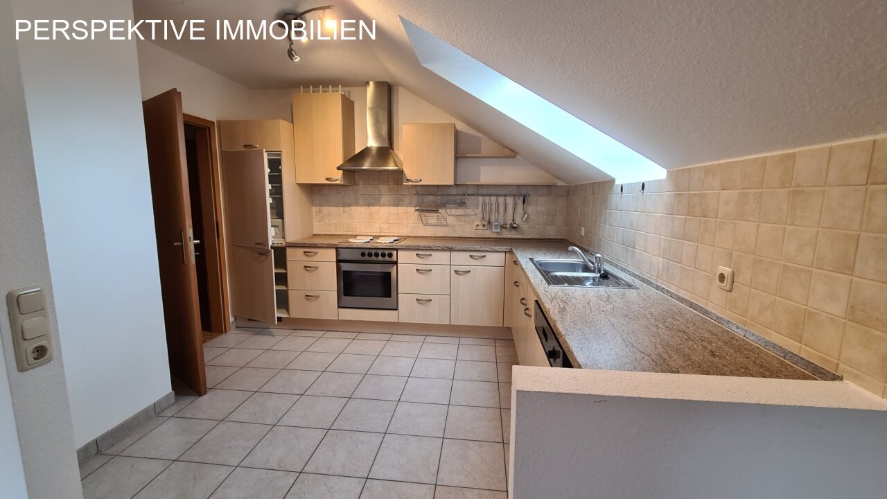 Gemütliche Dreizimmerwohnung im DG in schöner Lage