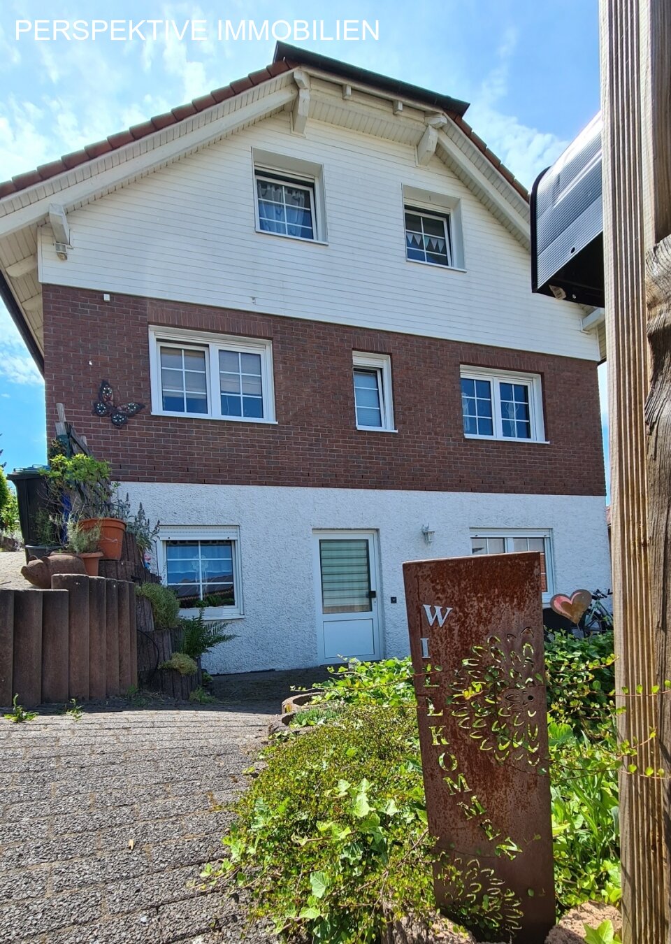 Romantisches Einfamilienhaus mit Einliegerwohnung und traumhaftem Garten