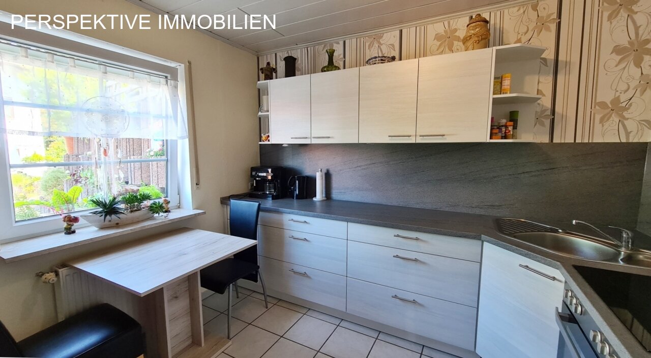 Romantisches Einfamilienhaus mit Einliegerwohnung und traumhaftem Garten