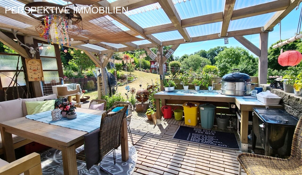 Romantisches Einfamilienhaus mit Einliegerwohnung und traumhaftem Garten