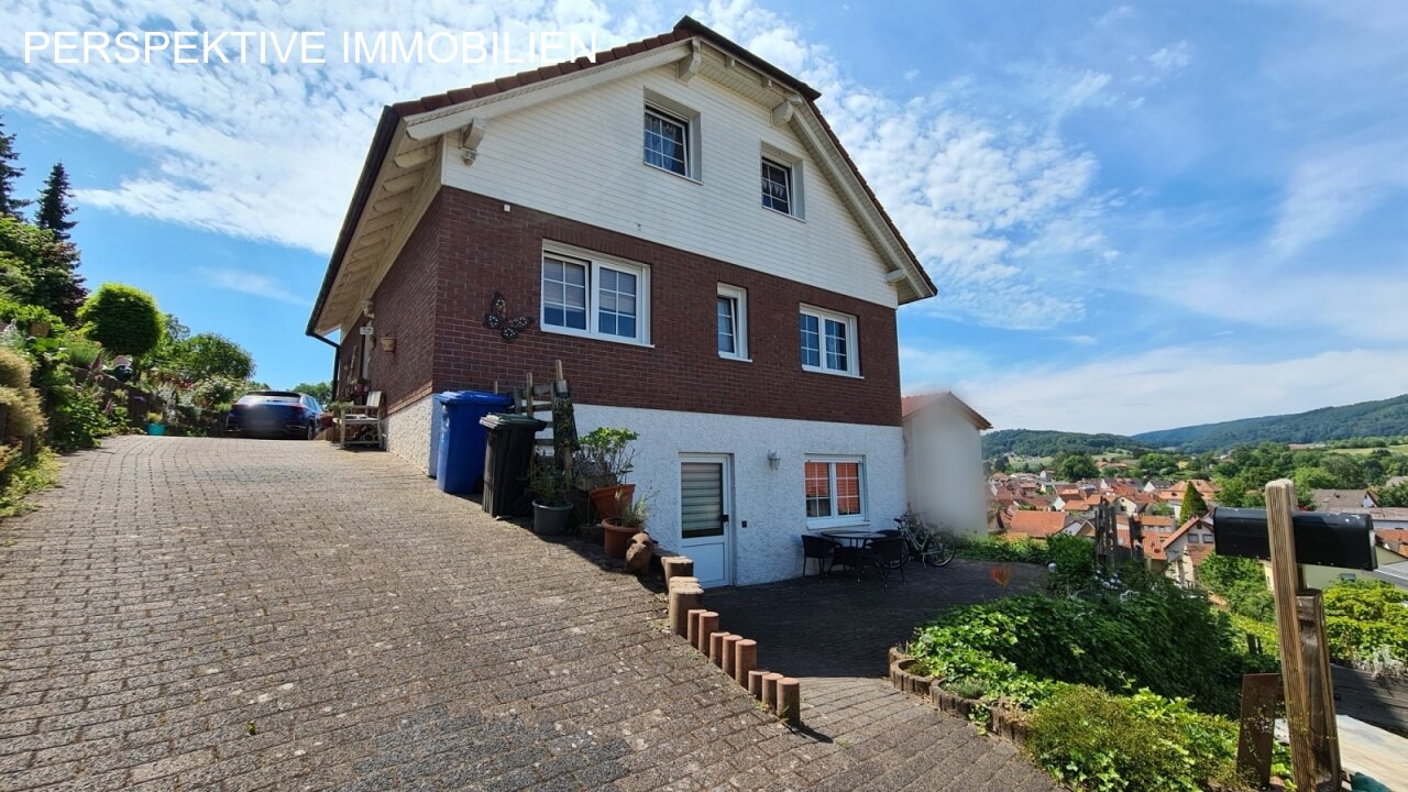 Romantisches Einfamilienhaus mit Einliegerwohnung und traumhaftem Garten