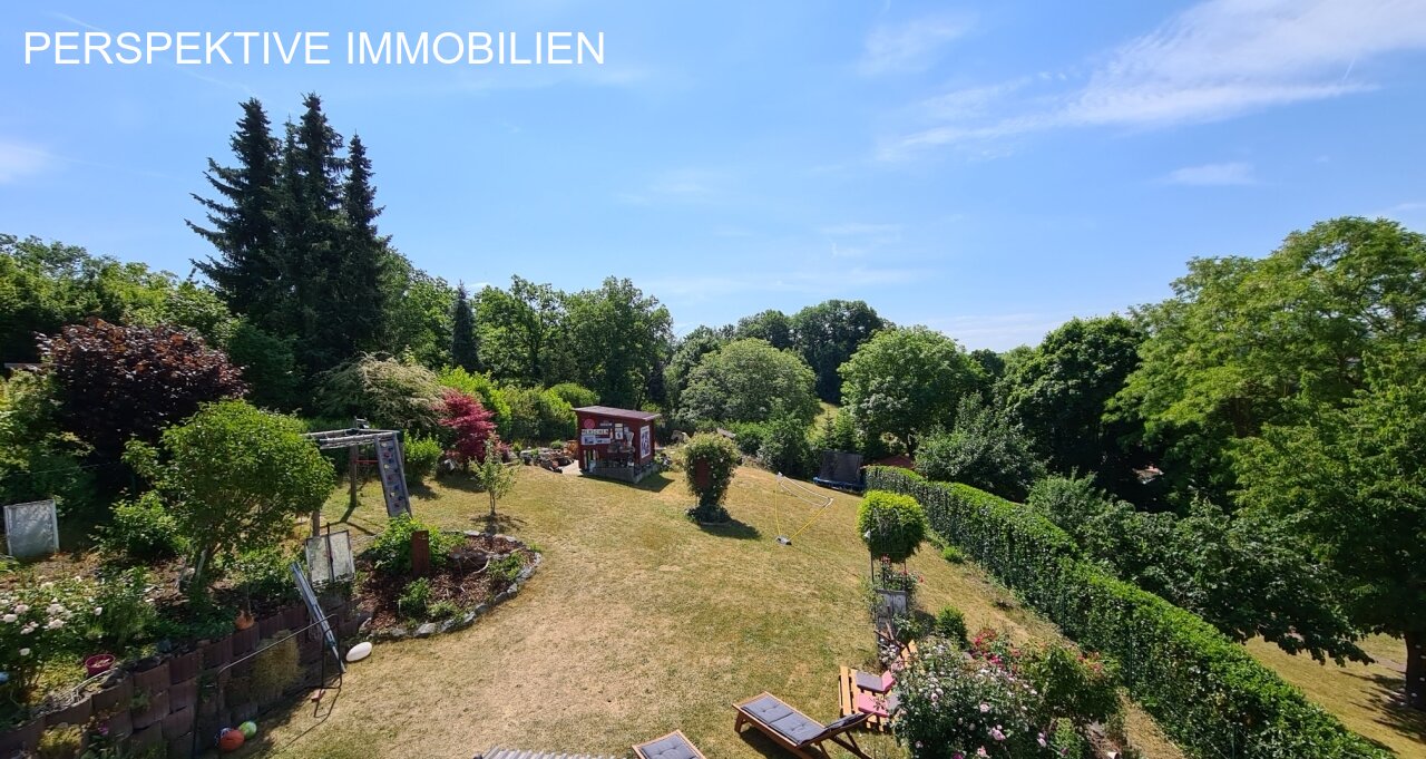 Romantisches Einfamilienhaus mit Einliegerwohnung und traumhaftem Garten