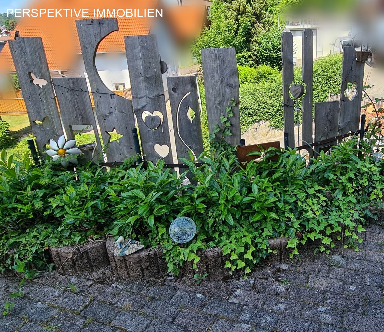 Romantisches Einfamilienhaus mit Einliegerwohnung und traumhaftem Garten