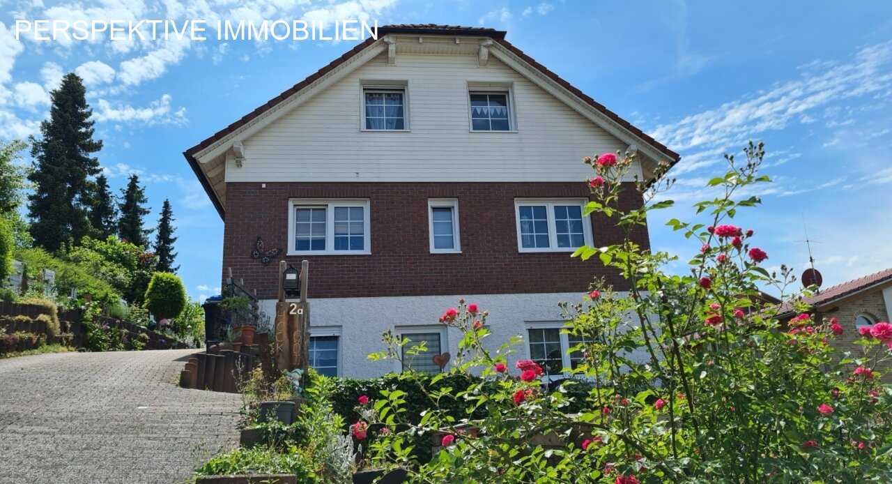 Romantisches Einfamilienhaus mit Einliegerwohnung und traumhaftem Garten